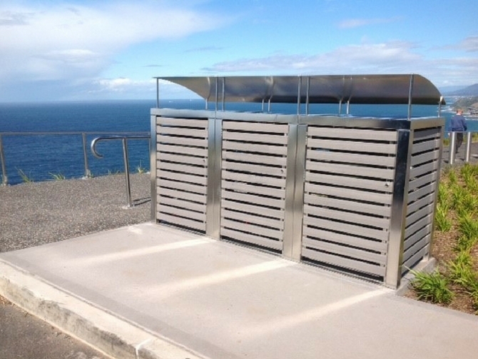 EM235 Bennelong Bin Enclosure 240L Triple, angled hood, composite Modwood battens - custom Wollongong City Council.jpg